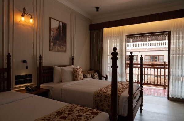 Home Stay room with balcony overlooking the courtyard
